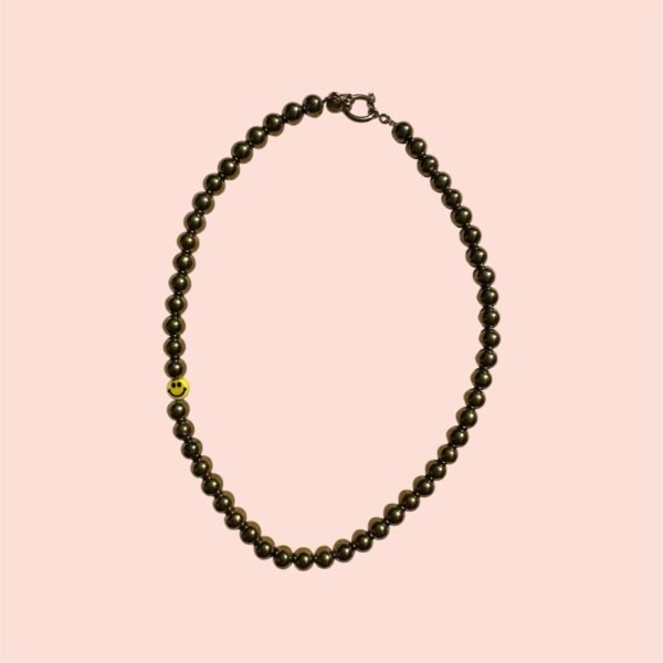Golden smiley necklace